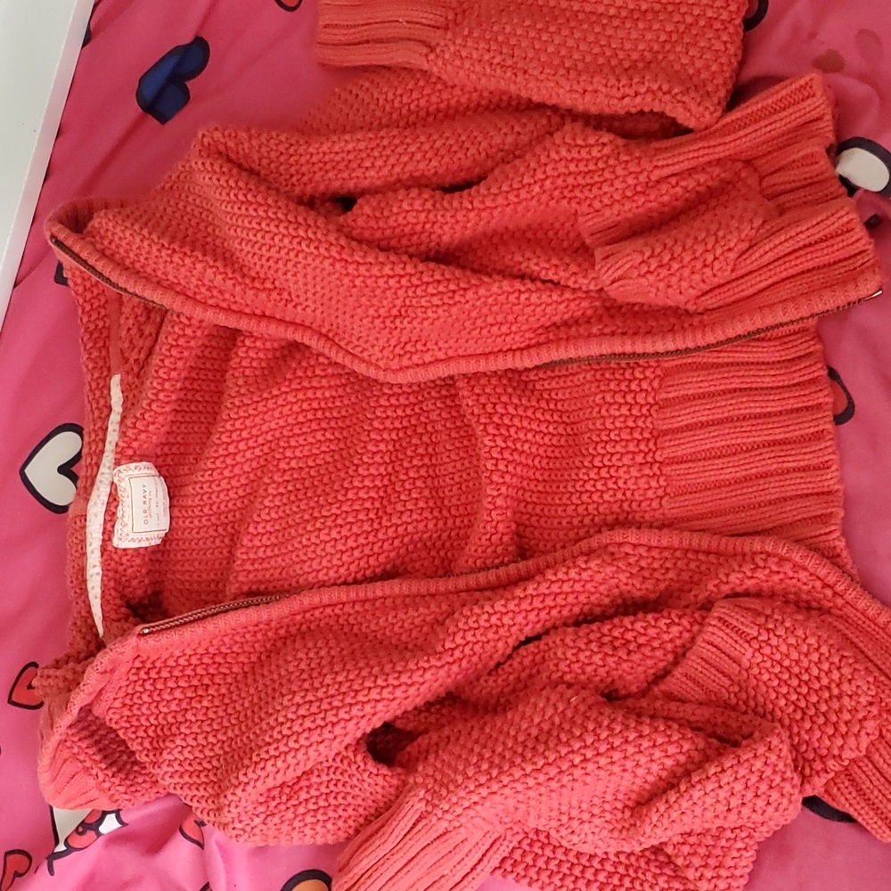 Orange knitted old name sweater